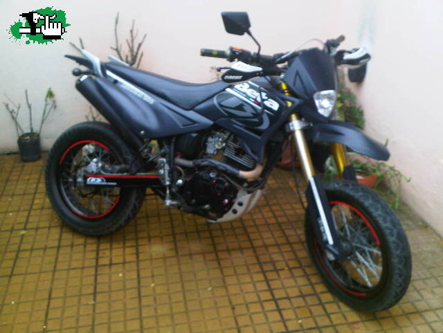 Beta motard 200cc por bici de dh