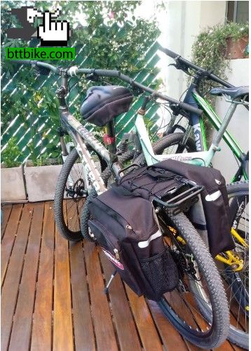 Bicicleta x Terra con alforjas