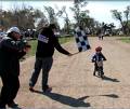 foto de Su primer carrera en camicleta.